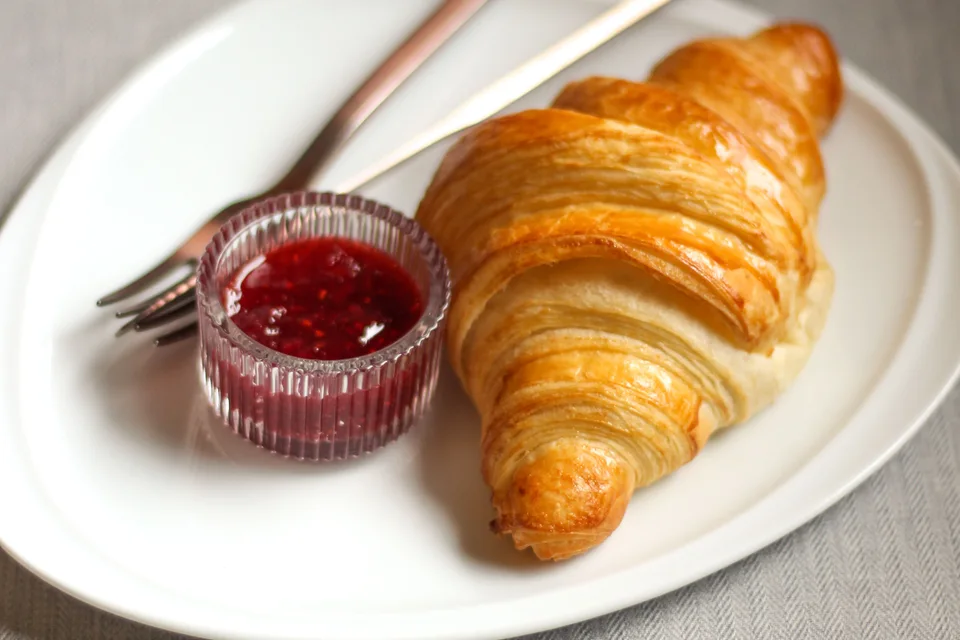 Example photo: Croissant served with jam